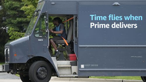 FILE - An Amazon truck makes deliveries in Wheeling, Ill., May 16, 2024. (AP Photo/Nam Y. Huh, File)