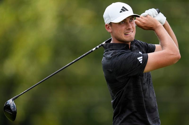 Ludvig Aberg, of Sweden hits from the eighth tee during the second round of the Tour Championship golf tournament, Friday, Aug. 30, 2024, in Atlanta. (AP Photo/Mike Stewart)