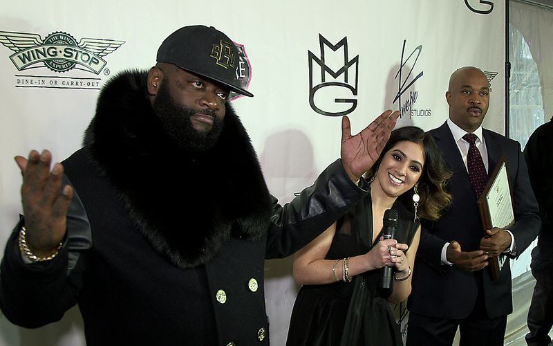Rap mogul Rick Ross (left) is bringing his Maybach Music Group to Atlanta in a partnership with Twelve Studios and its owner, Dina Marto. The pair wants to create a platform for songwriters and artists to meet and share their talents. Kwanza Hall, with the Atlanta city council, was also in attendance to award Marto with a city proclamation. RYON HORNE / RHORNE@AJC.COM Ross, partner Dina Marto and city councilman Kwanza Hall. Photo: Ryon Horne/AJC.