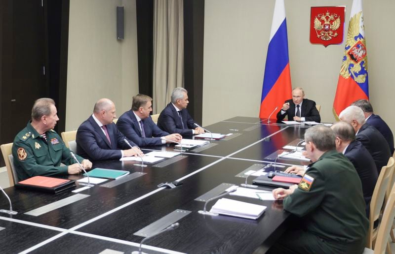 Russian President Vladimir Putin leads the meeting with top security and defense officials about the situation in Kursk and Belgorod border regions, at Novo-Ogaryovo state residence outside of Moscow, Russia, Monday, Aug. 12, 2024. (Gavriil Grigorov, Sputnik, Kremlin Pool Photo via AP)