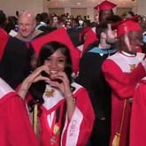 Students from Jonesboro High School in Clayton County walk inside the Clayton County Performing Arts Center at the start of their 2024 commencement ceremony. (Courtesy of Clayton County Schools)