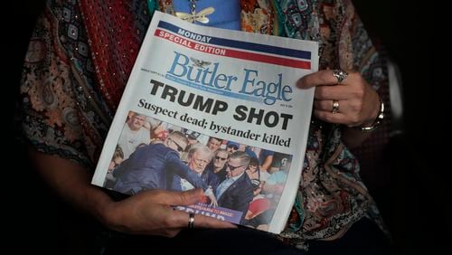 Donna Sybert, Managing Editor of the Butler Eagle newspaper, holds a Special Edition of the paper during an interview with The Associated Press, Wednesday, July 17, 2024, in Butler, Pa. (AP Photo/Matt Slocum)