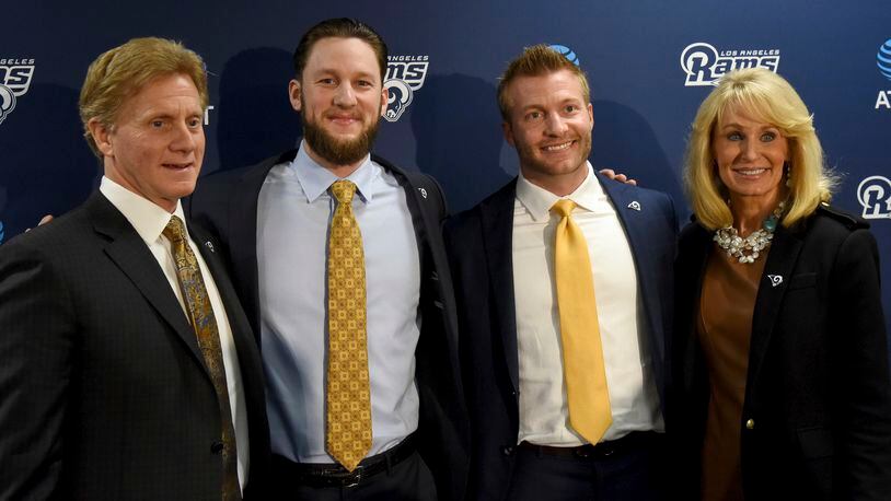 Los Angeles Rams head coach Sean McVay talks to quarterback John