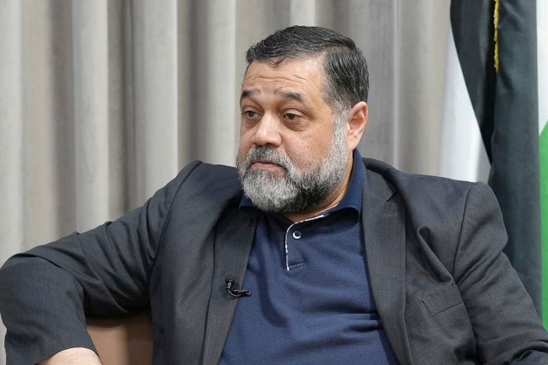 Hamas political official Osama Hamdan speaks during an interview with The Associated Press in Doha, Qatar, Tuesday Aug. 13, 2024. (AP Photo/Malak Harb)