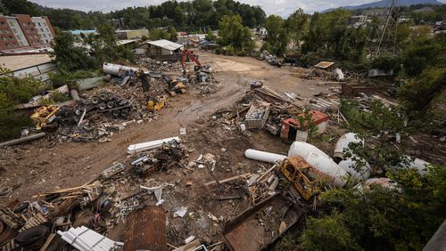 FILE - Debris is visible in the aftermath of Hurricane Helene, Sept. 30, 2024, in Asheville, N.C. (AP Photo/Mike Stewart, File)