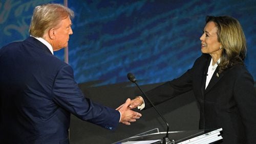 Vice President and Democratic presidential candidate Kamala Harris, right, shakes hands with former President and Republican presidential candidate Donald Trump during a presidential debate at the National Constitution Center in Philadelphia on Sept. 10, 2024. (Saul Loeb/AFP/Getty Images/TNS)