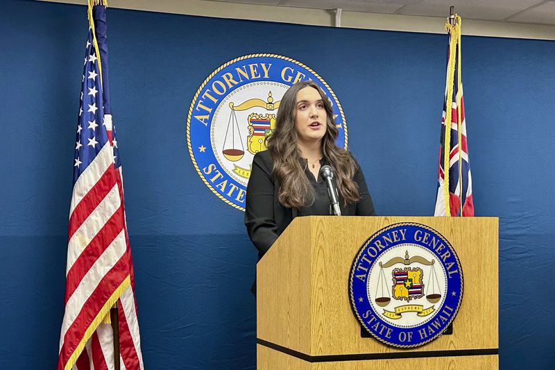 Hawaii Deputy Attorney General Ciara Kahahane, who grew up in Lahaina, discusses a wildfire investigation during a news conference in Honolulu on Friday, Sept. 13, 2024. (AP Photo/Jennifer Sinco Kelleher)