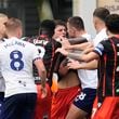 Blackburn Rovers' Owen Beck is confronted by Preston North End's Milutin Osmajic before being shown a red card, during an English Football League soccer match, at Deepdale, in Preston, England, Sunday, Sept. 22, 2024. (Nick Potts/PA via AP)