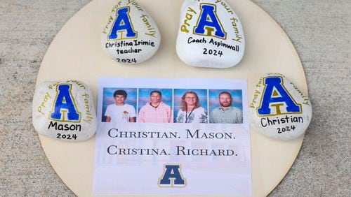 A memorial with the names of the four victims of the shooting at Apalachee High School and their images are shown at the Jug Tavern Park on, Friday, Sept. 6, 2024, in Winder. (Jason Getz / AJC)