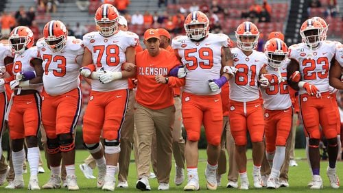 Dabo Swinney leads his team onto field during Clemson's game at Williams-Brice Stadium Nov. 30, 2019 in Columbia, S.C.