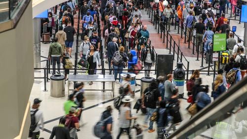 May 17, 2021 Atlanta: The main security checkpoint was full for Memorial Day travel at Hartsfield-Jackson International Airport. (John Spink / John.Spink@ajc.com)