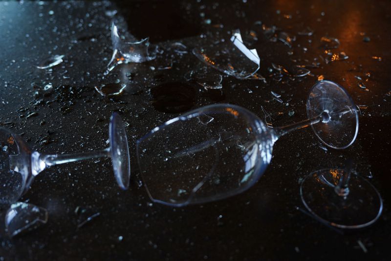 Broken wine glasses are seen in a damaged restaurant that was hit during Iran's missile attack in Tel Aviv, Israel, Wednesday, Oct. 2, 2024. (AP Photo/Ariel Schalit)