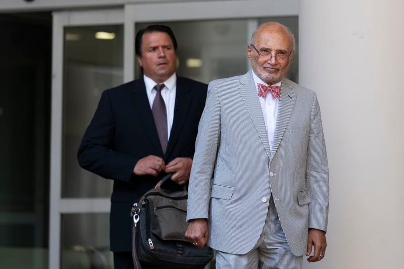 Attorneys Jason Foster, left, and Billy Murphy, right, leave the Edward A. Garmatz United States District Courthouse in Baltimore, Thursday, June 20, 2024. (AP Photo/Stephanie Scarbrough)
