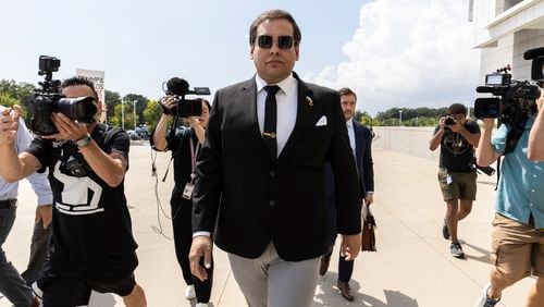 Former U.S. Rep. George Santos arrives at court in Central Islip, N.Y., Monday, Aug. 19, 2024. (AP Photo/Stefan Jeremiah)