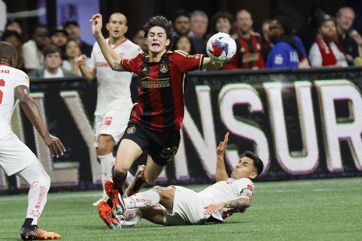 Atlanta United forward Luke Brennan (52) reacts as he gets fouled during the second half against Liga MX Toluca of an exhibition match on Wednesday, Feb 15, 2023, in Atlanta.
 Miguel Martinez / miguel.martinezjimenez@ajc.com