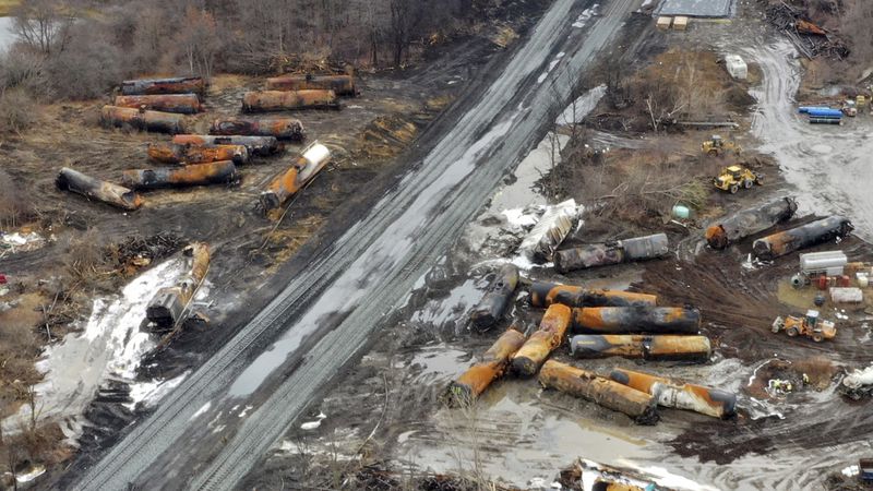 FILE -This photo taken with a drone shows the continuing cleanup of portions of a Norfolk Southern freight train that derailed Friday night in East Palestine, Ohio, Thursday, Feb. 9, 2023. The goal of a new federal rule finalized Monday, June 24, 2024 is ensuring first responders can find out what hazardous chemicals are on a train almost immediately after a derailment, so they can respond appropriately. (AP Photo/Gene J. Puskar, File)