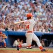 FILE - Pete Rose of the Cincinnati Reds in action at the bat against the Atlanta Braves in Atlanta, Aug. 2, 1978. At left is Atlanta catcher Joe Nolan. (AP Photo, File)