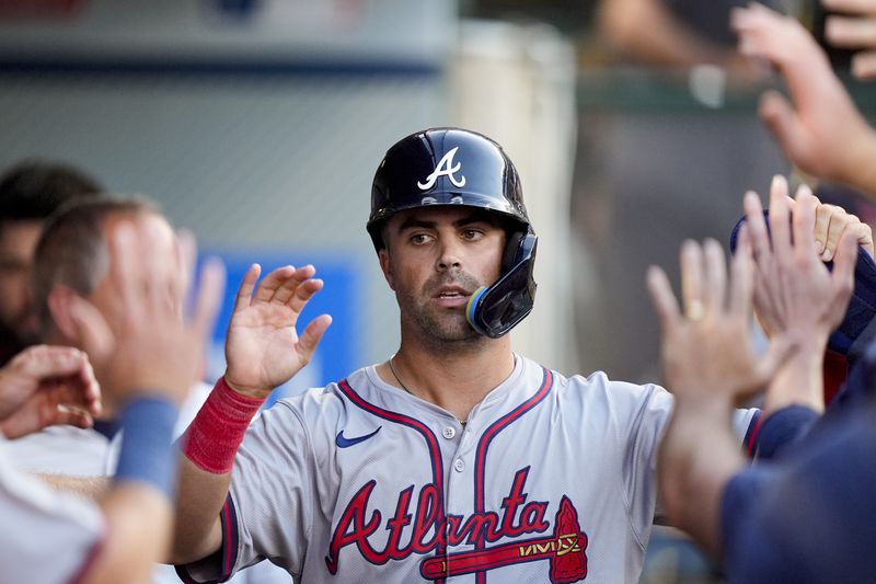 Atlanta Braves' Whitt Merrifield celebrates after scoring off a single hit by Michael Harris II during the second inning of a baseball game against the Los Angeles Angels, Saturday, Aug. 17, 2024, in Anaheim, Calif. (AP Photo/Ryan Sun)