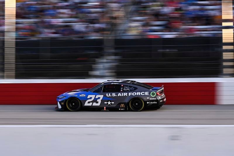 Bubba Wallace steers down the front stretch during a NASCAR Cup Series auto race at Darlington Raceway, Sunday, Sept. 1, 2024, in Darlington, S.C. (AP Photo/Matt Kelley)