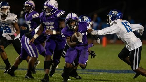 Miller Grove's Jayden Brown (1) carries the ball during a GHSA high school football game between Stephenson High School and Miller Grove High School at James R. Hallford Stadium in Clarkston, GA., on Friday, Oct. 8, 2021. (Photo/Jenn Finch)