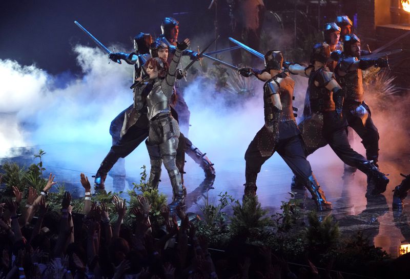 Chappell Roan, center, performs "Good Luck, Babe" during the MTV Video Music Awards on Wednesday, Sept. 11, 2024, at UBS Arena in Elmont, N.Y. (Photo by Charles Sykes/Invision/AP)