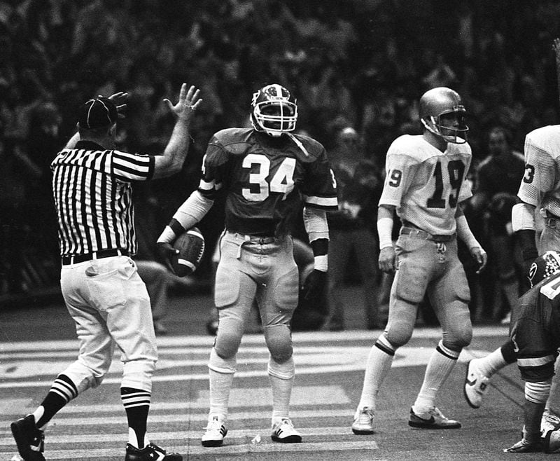 Georgia's Herschel Walker scores a TD in the 1981 Sugar Bowl against Notre Dame. AJC file photo