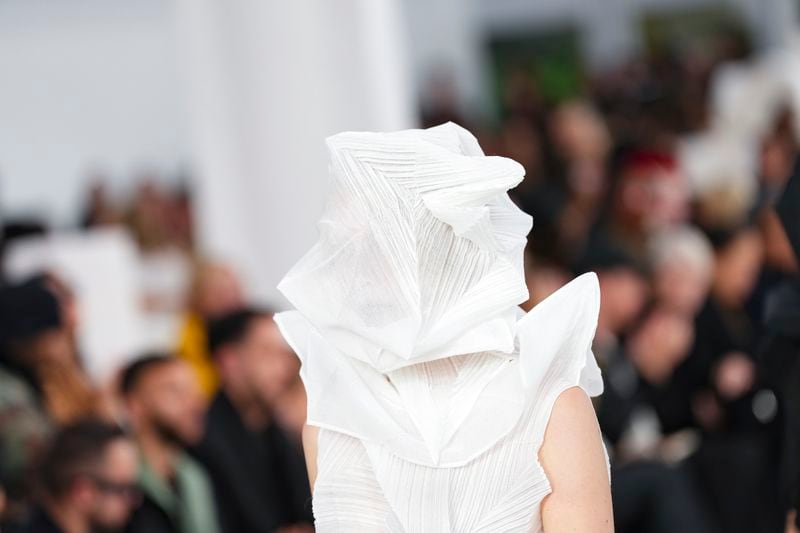 A model wears a creation as part of the Issey Miyake Spring/Summer 2025 collection presented Friday, Sept. 27, 2024 in Paris. (Photo by Scott A Garfitt/Invision/AP)