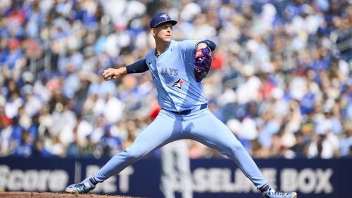 Toronto Blue Jays pitcher Bowden Francis throws the ball during first inning of a baseball game against the Los Angeles Angels in Toronto, Saturday, Aug. 24, 2024. (Christopher Katsarov/The Canadian Press via AP)