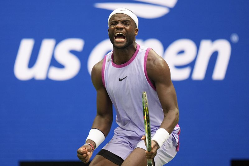 FILE - Frances Tiafoe reacts during a match against Ben Shelton during the third round of the U.S. Open tennis championships on Aug. 30, 2024, in New York. (AP Photo/Seth Wenig, File)