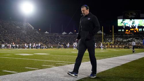 FILE - Florida head coach Billy Napier roams the sidelines during the second half of an NCAA college football game against Missouri Saturday, Nov. 18, 2023, in Columbia, Mo. (AP Photo/Jeff Roberson, File)