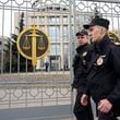 FILE - Police officers guard the Moscow City Court entrance, in Moscow, Russia, Monday, April 17, 2023. (AP Photo/Alexander Zemlianichenko, File)