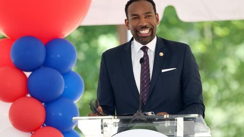 080422 Atlanta, Ga.: Atlanta Mayor Andre Dickens speaks during the ceremony for the new statue and mural in honor of Hank Aaron at the Adams Park baseball complex,Thursday, August 4, 2022, in Atlanta. (Jason Getz / Jason.Getz@ajc.com)