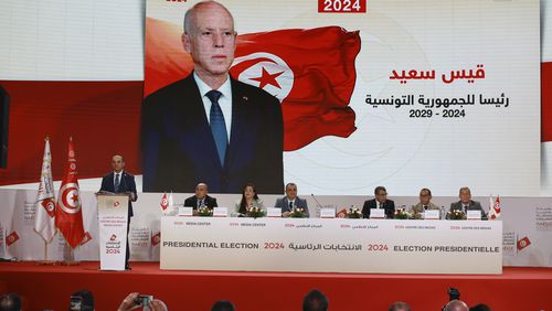 Election officials announce Tunisian president and candidate for re-election Kais Saied as the winner of the presidential elections, in the capital Tunis, Tunisia, Monday, Oct. 7, 2024. (AP Photo/Anis Mili)