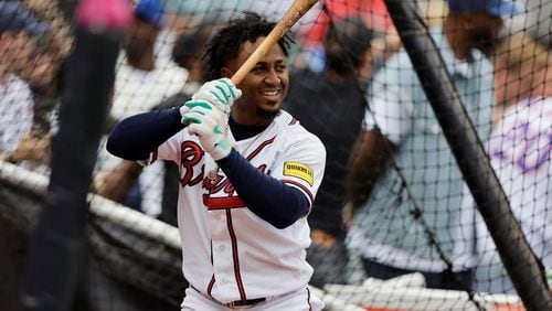 Ozzie Albies stands in the batting cage during Monday's All-Star activities in Seattle. (AP Photo/John Froschauer)
