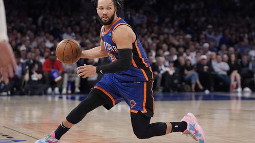 FILE - New York Knicks' Jalen Brunson looks to pass the ball during the second half of Game 5 in an NBA basketball second-round playoff series against the Indiana Pacers, May 14, 2024, in New York. Brunson has agreed to a four-year contract extension worth about $156.5 million with the Knicks, a person with knowledge of the details said Friday, July 12, 2024. (AP Photo/Frank Franklin II, File)