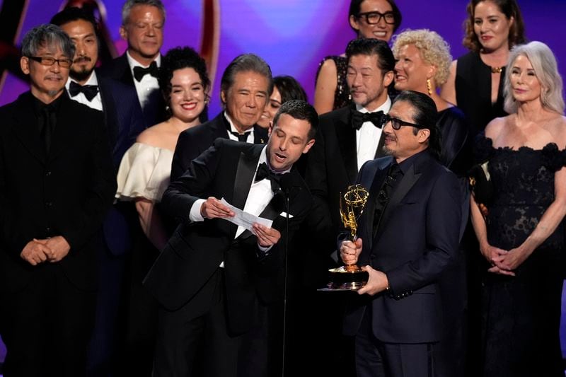 Justin Marks, center, Hiroyuki Sanada, and the team from "Shogun" accept the award for outstanding drama series during the 76th Primetime Emmy Awards on Sunday, Sept. 15, 2024, at the Peacock Theater in Los Angeles. (AP Photo/Chris Pizzello)