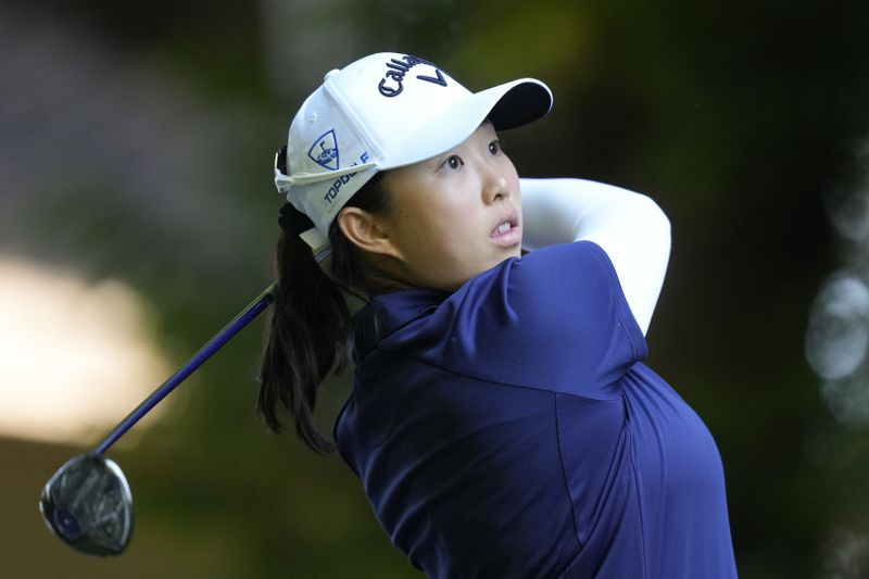 Ruoning Yin, of China, hits off the 16th tee during the first round of the Women's PGA Championship golf tournament at Sahalee Country Club, Thursday, June 20, 2024, in Sammamish, Wash. (AP Photo/Gerald Herbert)
