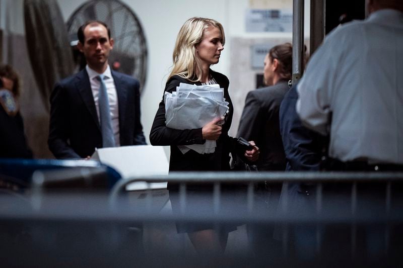 Natalie Harp follows former President Donald Trump as they arrive at Manhattan criminal court as jurors are expected to begin deliberations in Trump's criminal hush money trial in New York, Wednesday, May 29, 2024. (Jabin Botsford/The Washington Post via AP, Pool)