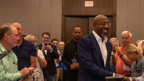 U.S. Sen. Raphael Warnock, who was a guest on a live edition of "Politically Georgia" in Savannah, said  his faith as a senior pastor at Ebenezer Baptist Church in Atlanta helps shape his approach to issues such as health care access. (AJC Photo/Katelyn Myrick)