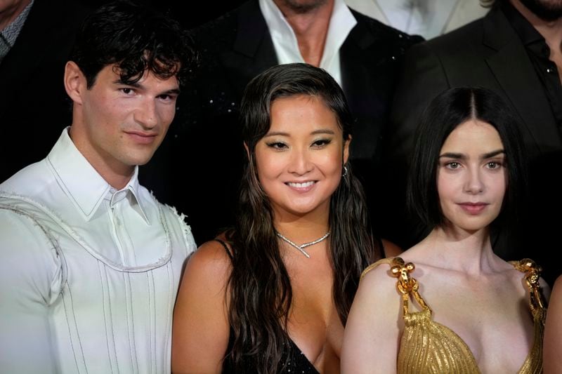 From left, actors Paul Forman, Ashley Park and Lily Collins arrive at the premiere of "Emily in Paris", in Rome, Tuesday, Sept. 10, 2024. (AP Photo/Andrew Medichini)