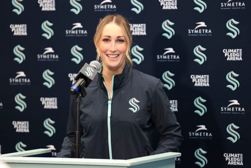 Seattle Kraken new assistant coach Jessica Campbell speaks during an NHL hockey press conference Wednesday, July 3, 2024, in Seattle. Campbell will become the first woman to work on the bench of an NHL franchise after the team hired her as an assistant coach. (AP Photo/Jason Redmond)