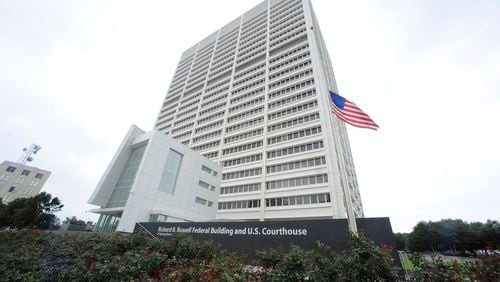 FILE - The Richard B. Russell Federal Building stands, July 21, 2012, in Atlanta. A new federal lawsuit challenges a Georgia law that expands cash bail and restricts organizations that help people pay bail so they can be released while their criminal cases are pending. (AP Photo/Mike Stewart, File)