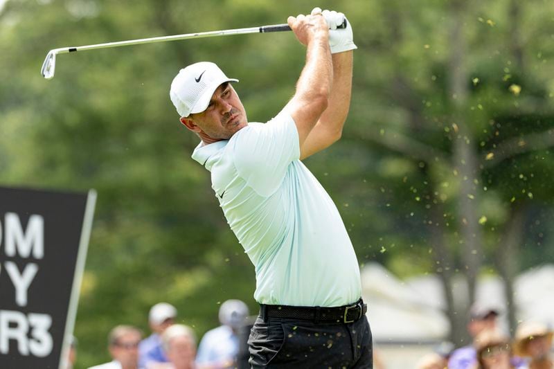 Captain Brooks Koepka, of Smash GC, hits from the 15th tee during the second round of LIV Golf Greenbrier at The Old White at The Greenbrier, Saturday, Aug. 17, 2024, in White Sulphur Springs, W.Va. (Scott Taetsch/LIV Golf via AP)