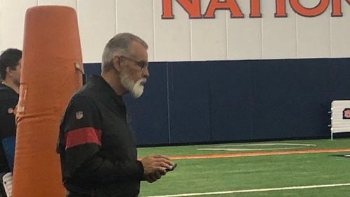 Falcons national scout Phil Emery closely watching the tight end drills at Auburn's Pro Day on Friday. (By D. Orlando Ledbetter/dledbetter@ajc.com)
