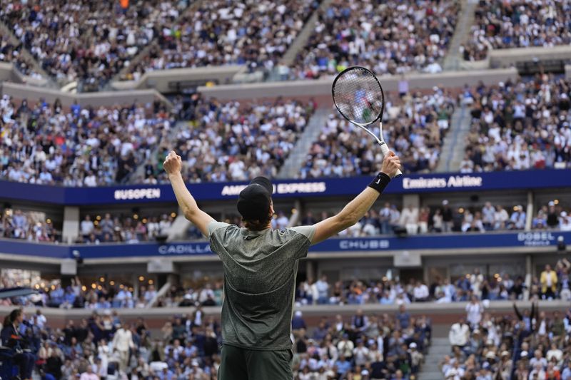 Jannik Sinner, of Italy, reacts after defeating Taylor Fritz, of the United States, to win the men's singles final of the U.S. Open tennis championships, Sunday, Sept. 8, 2024, in New York. (AP Photo/Julia Nikhinson)