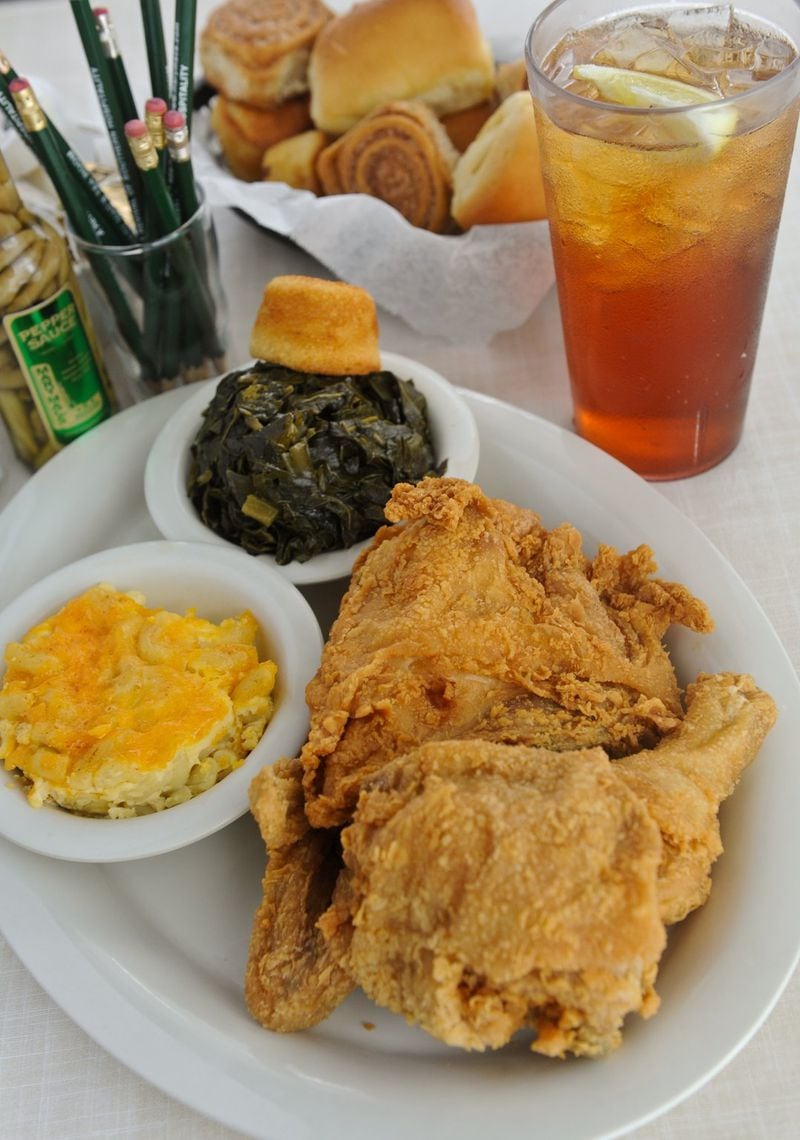 The return of one of Atlanta’s most endearing Southern restaurants means the return of crowd favorites like fried chicken, collards and mac and cheese. It also means old-school pencils and order forms at tables. / Becky Stein for The Atlanta Journal-Constitution
