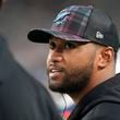 Miami Dolphins quarterback Tua Tagovailoa talks on the sidelines during the second half of an NFL football game against the Tennessee Titans, Monday, Sept. 30, 2024, in Miami Gardens, Fla. (AP Photo/Rebecca Blackwell)