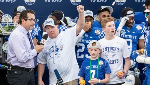 Kentucky Wildcats coach Mark Stoops is interviewed by former Georgia Tech quarterback and new ACC Network broadcaster Tom Luginbill after the VRBO Citrus Bowl in Orlando, Florida, on Jan. 1, 2022. (Willie J. Allen Jr./Orlando Sentinel/TNS)