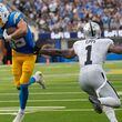 Los Angeles Chargers wide receiver Ladd McConkey (15) runs toward the end zone to score against Las Vegas Raiders safety Marcus Epps (1) during the second half of an NFL football game, Sunday, Sept. 8, 2024, in Inglewood, Calif. (AP Photo/Marcio Jose Sanchez)