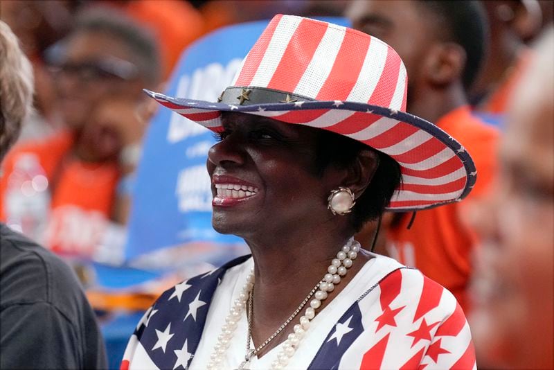 A supporter listens as Democratic presidential nominee Vice President Kamala Harris speaks at a campaign event at Northwestern High School in Detroit, Monday, Sept. 2, 2024. (AP Photo/Jacquelyn Martin)